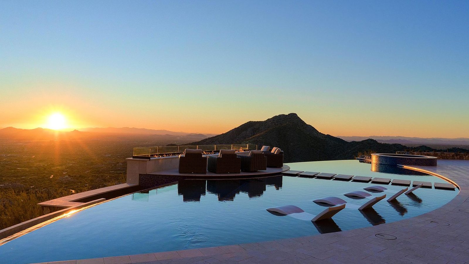 Infinity-edge pool at sunset overlooking the desert at Altitude at Silverleaf, Scottsdale