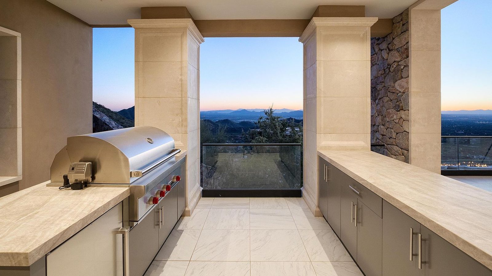 Outdoor kitchen with desert views at a custom home at Altitude at Silverleaf, Scottsdale