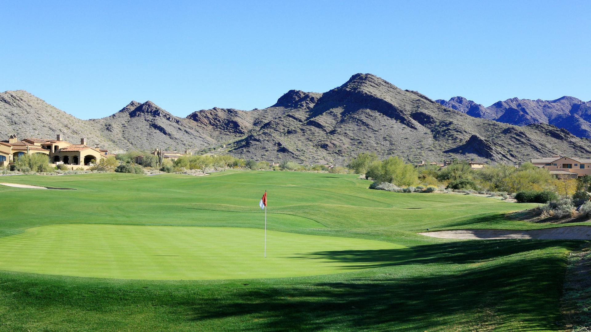 Golf course fairway with the McDowell Mountains behind it in DC Ranch, Scottsdale