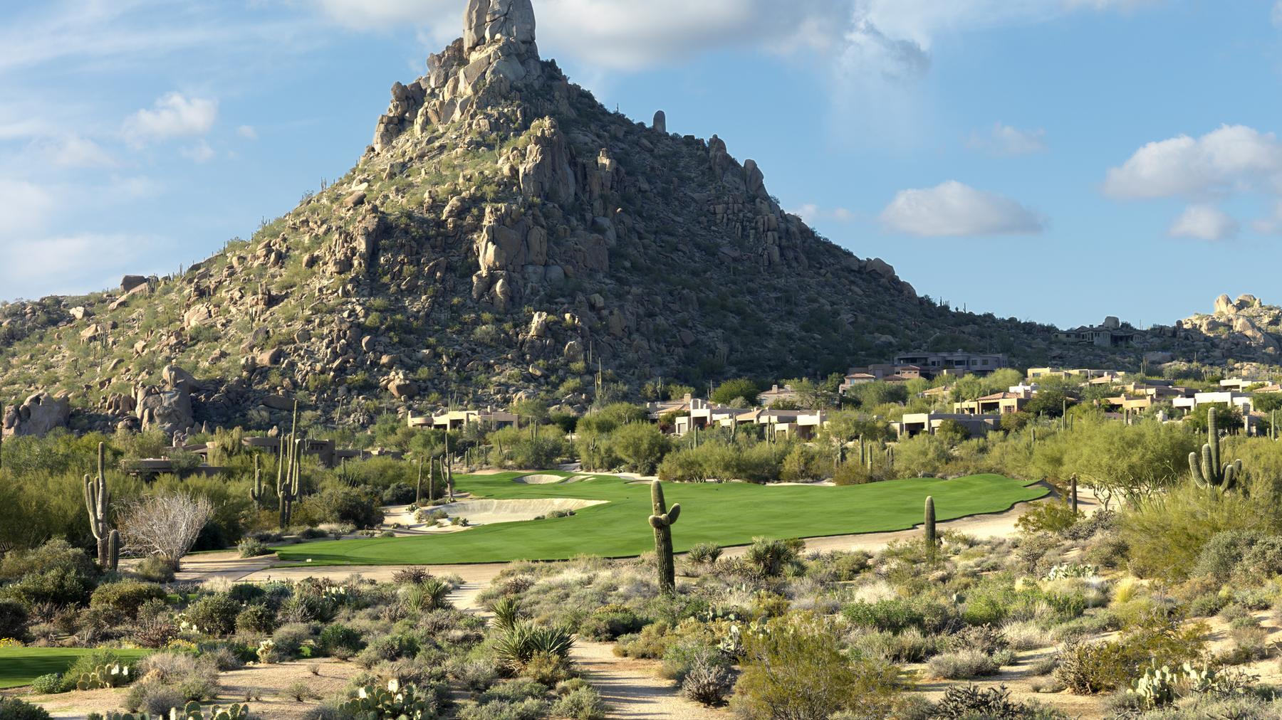Pinnacle Peak rising above the desert golf course at Desert Highlands, Scottsdale