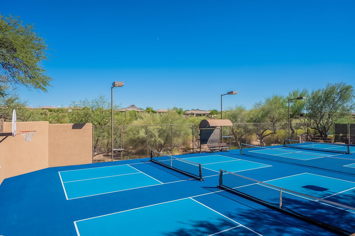 Pickleball courts with lighting and desert views in the Legend Trail community in Scottsdale