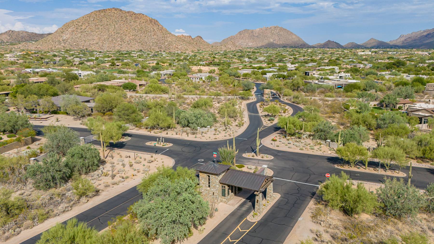 Aerial view of Pinnacle Peak Place neighborhood and mountains, Scottsdale
