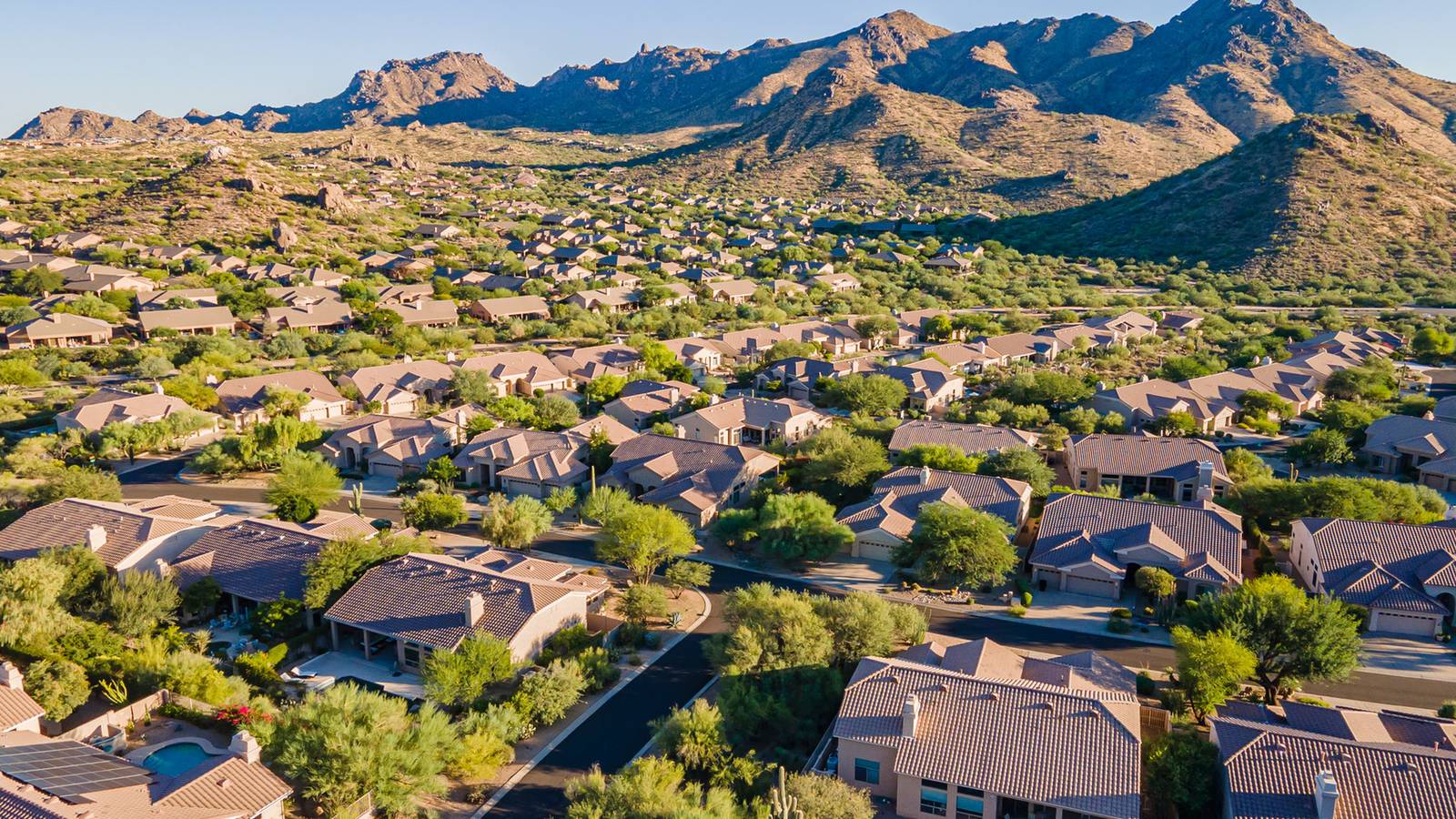 Aerial view of desert homes and mountains in the Troon foothills of north Scottsdale