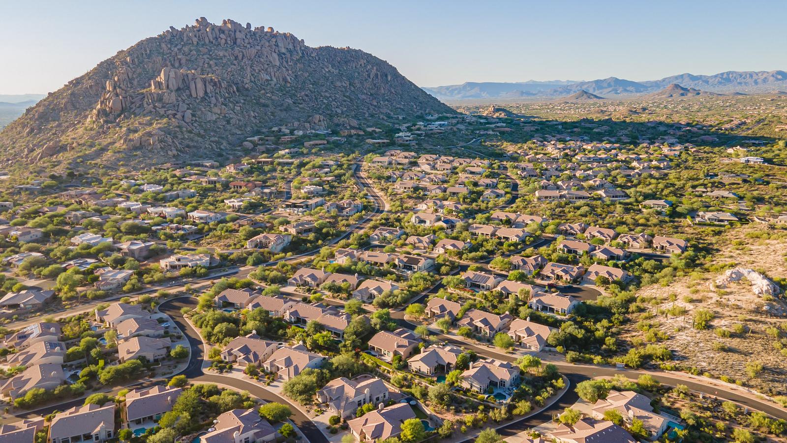 Aerial view of homes beneath Troon Mountain in the Troon area of north Scottsdale