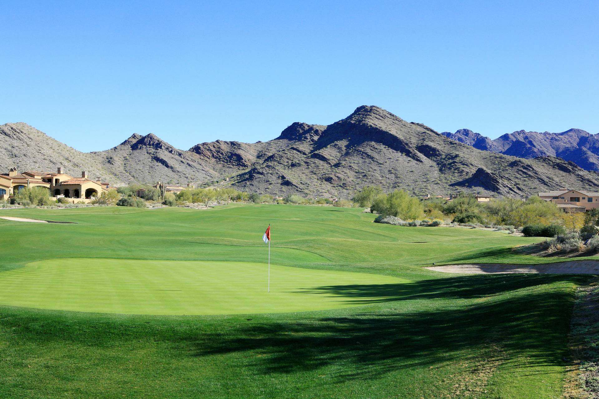 Golf course fairway with the McDowell Mountains behind it in DC Ranch, Scottsdale