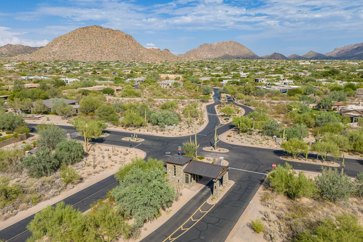 Aerial view of Pinnacle Peak Place neighborhood and mountains, Scottsdale