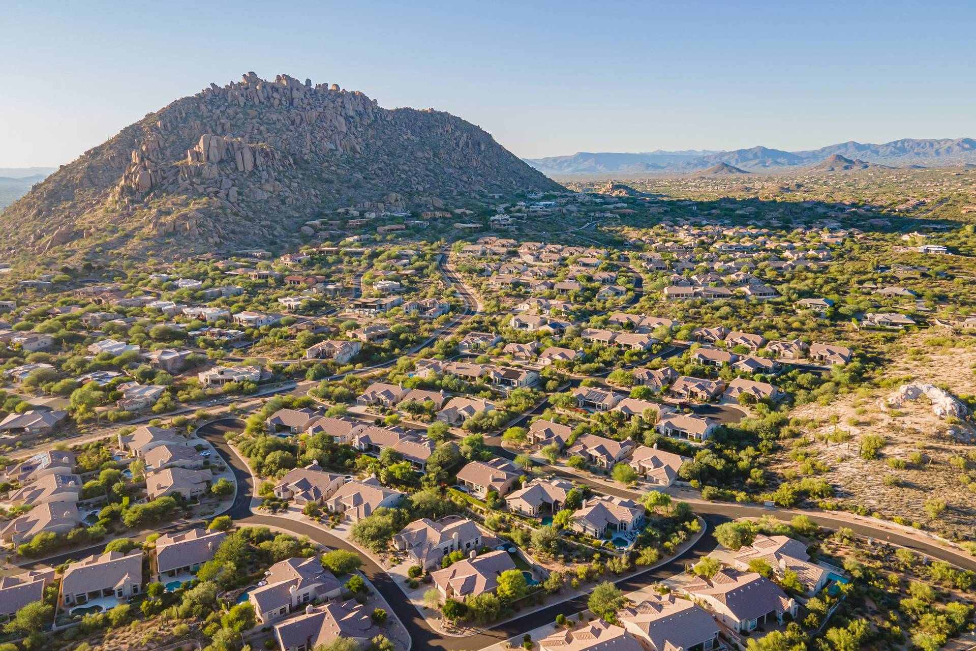 Aerial view of homes beneath Troon Mountain in the Troon area of north Scottsdale